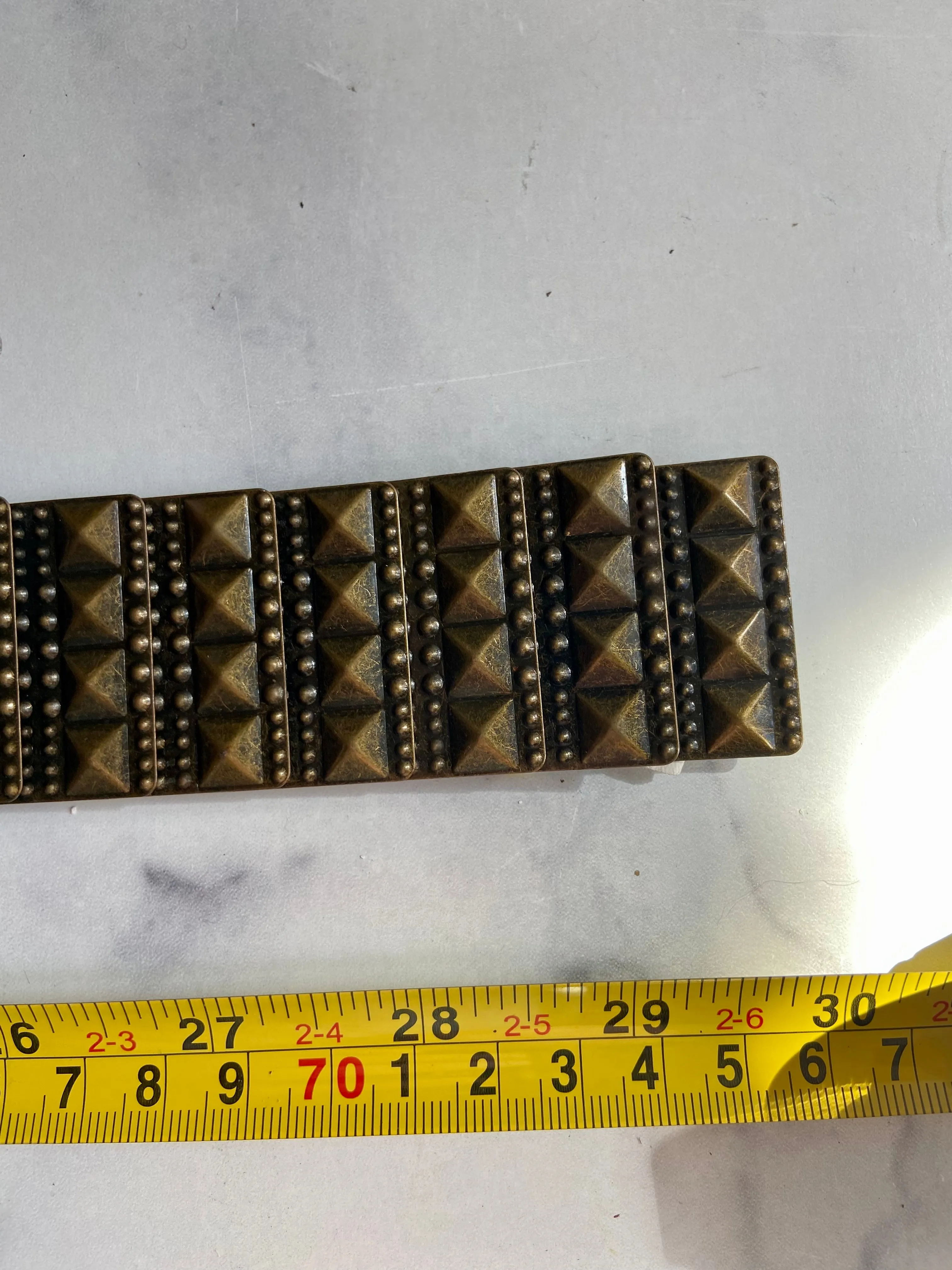 Elastic metal bronze belt